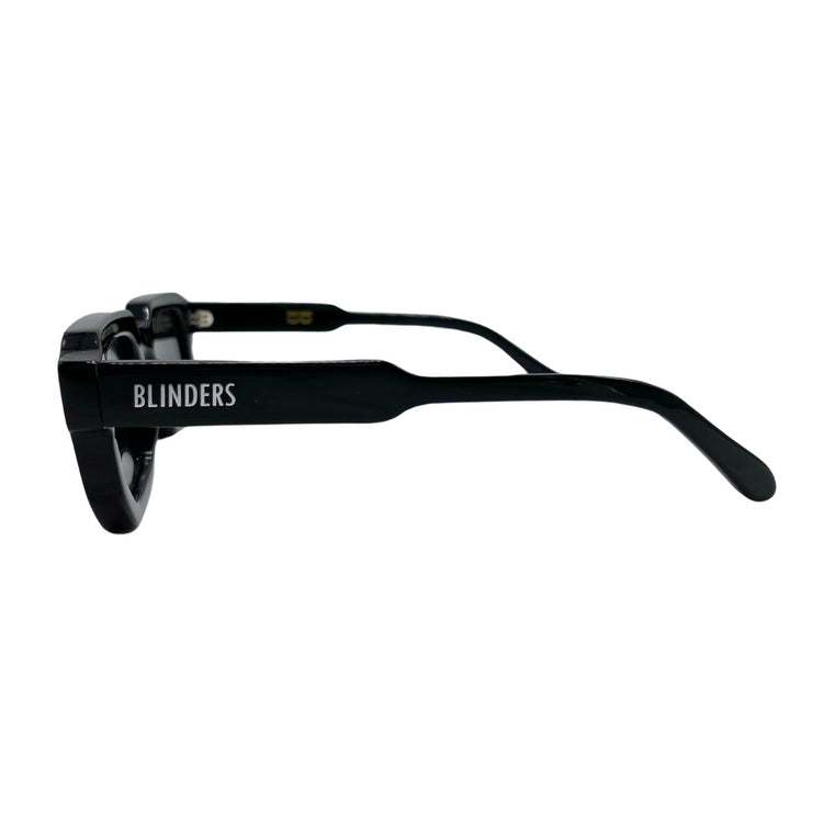 Lentes de sol Blinders modelo Black Chris con marco negro rectangular y lentes negros, estilo urbano unisex, protección UV400.